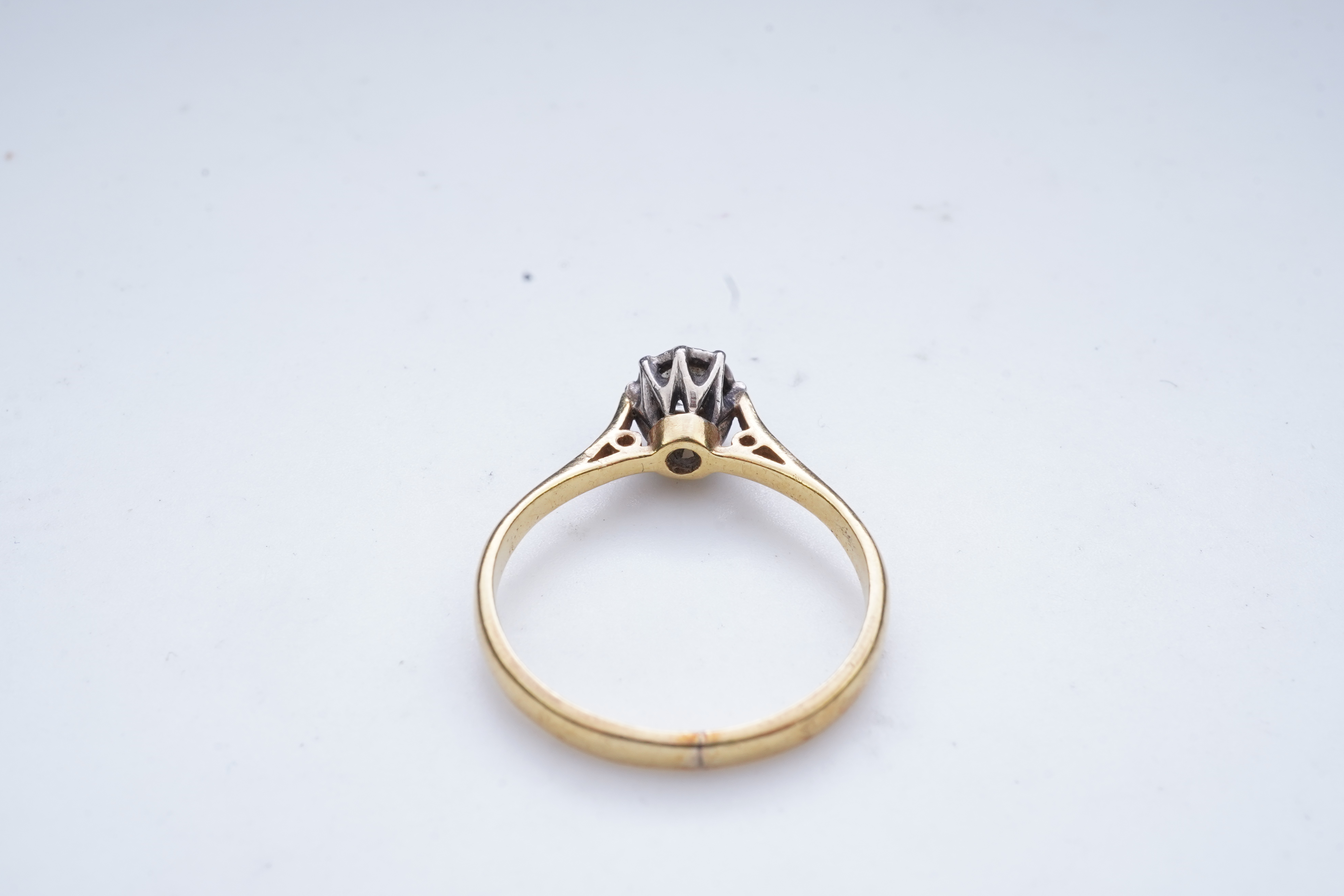 A diamond solitaire ring